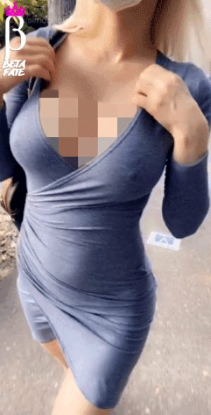 A hot blonde reveals her tits while walking on the street (beta loser version)