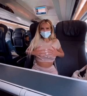 Blonde playing with her big tits