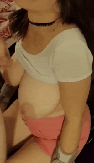 Brunette gets tits sprayed