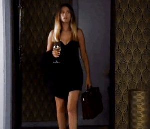 Emmerdale Debbie Dingle very short black dress walking in hotel room