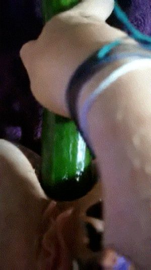 Horny slut girlfriend fucks her asshole with huge cucumber