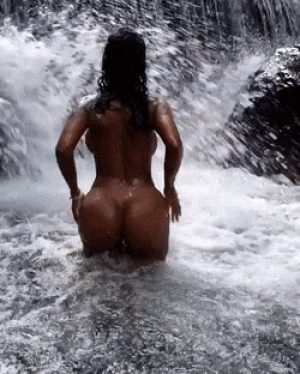 Hot Colombian lady twerking near a waterfall