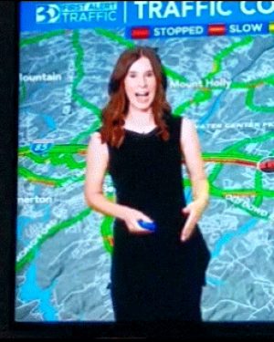 Robot Weathergurl can do traffic, too. Will she do you?