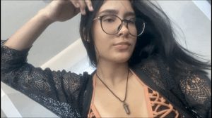 Sexy teen latina showing off bikini body in bathroom