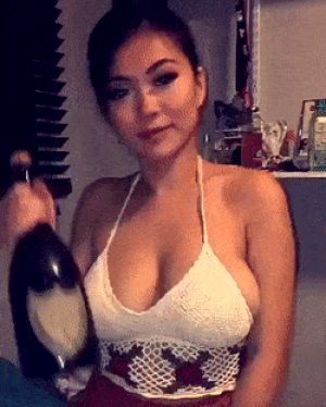 Vicki Li – opening a bottle & shaking her tits in your face GIF